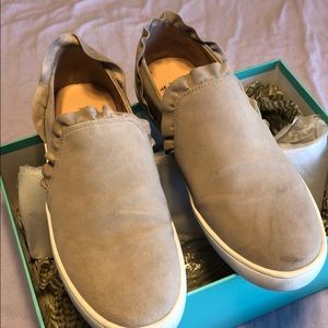 Kate Spade gray suede slip on with ruffle.